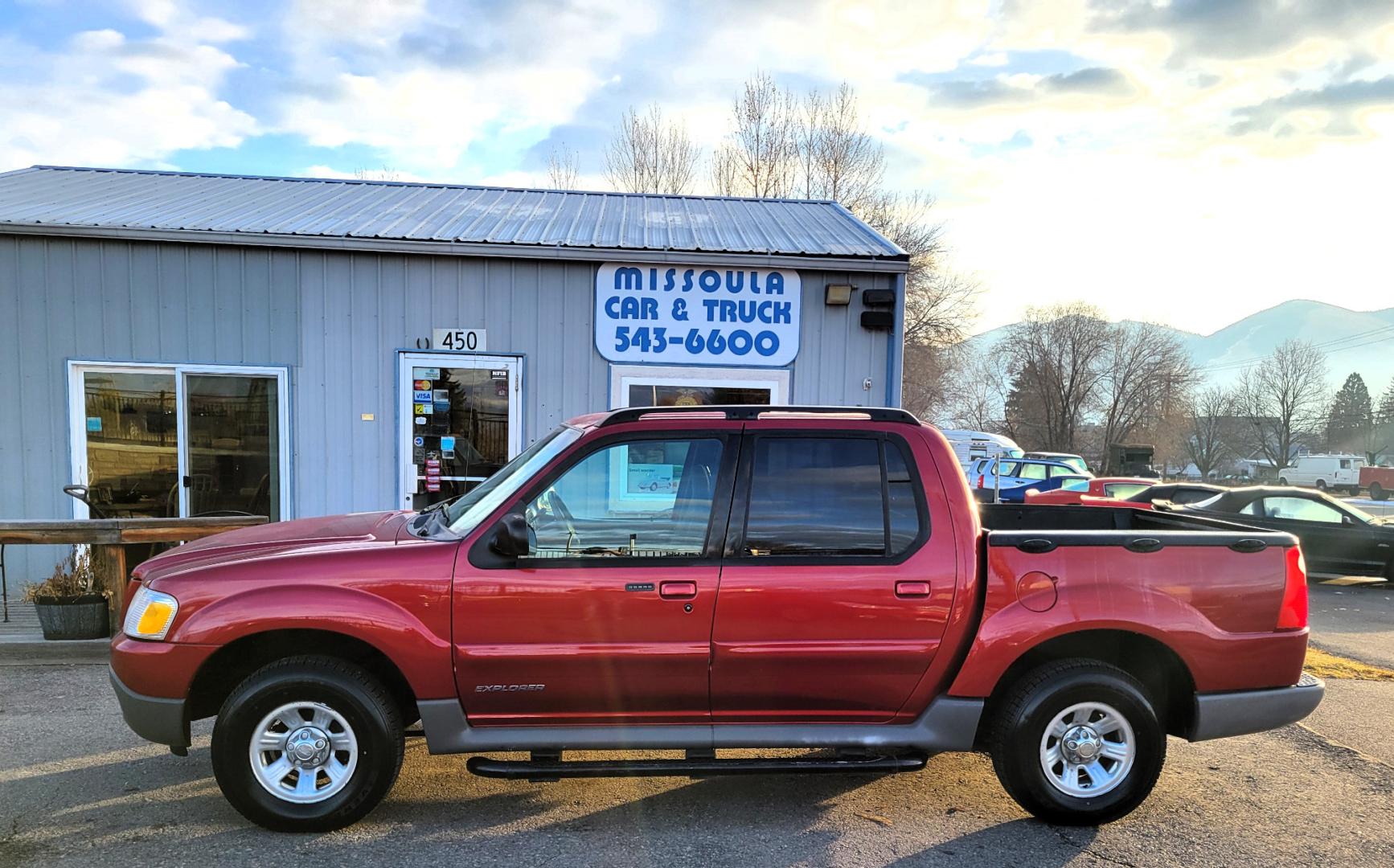 2001 Red /Gray Ford Explorer Sport Trac Sport Trac (1FMZU77E41U) with an 4.0L V6 engine, Automatic transmission, located at 450 N Russell, Missoula, MT, 59801, (406) 543-6600, 46.874496, -114.017433 - Highly Desirable little 4WD. Only 86K Miles. Air. Cruise. Tilt. Power Drivers Seat. Power Windows and Locks. AM FM CD Changer. Clean Carfax. This vehicle is more then 20 years old and is not eligible for lending through our finance companies. - Photo#6